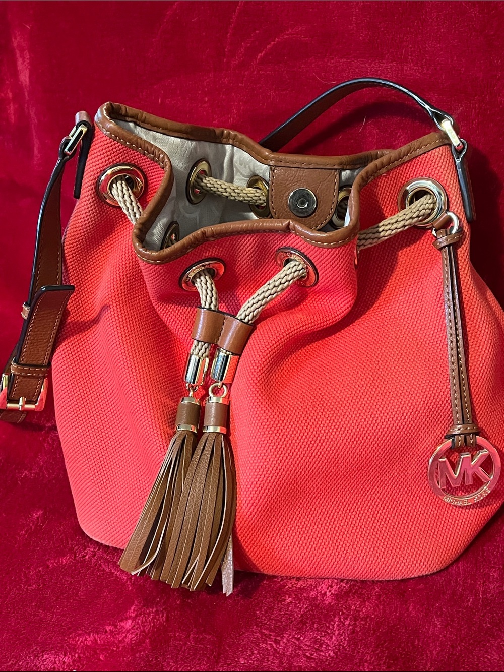 Michael Kors Coral with Brown Trim Tassel Drawstring Shoulder Bag